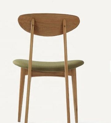 Προσθέστε μια πινελιά κομψότητας στην τραπεζαρία σας με μια τραπεζαρική καρέκλα από πράσινο ξύλο